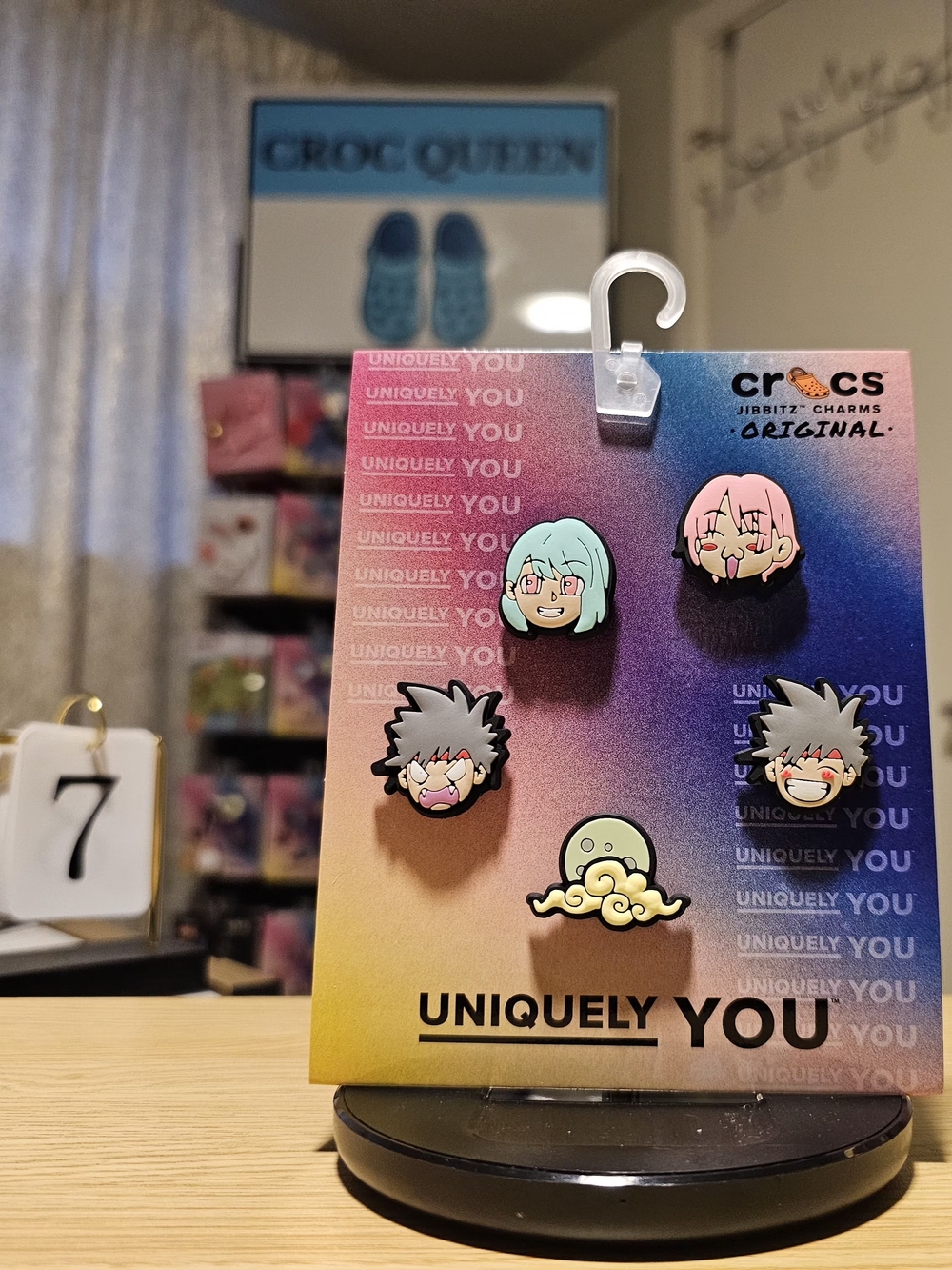 Set of five Crocs Jibbitz Featuring Anime Style Faces And A Moon Cloud.